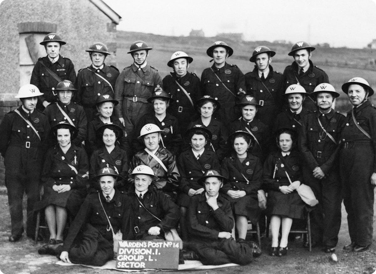 Air raid wardens in Swansea, recognised for their contribution to the war effort.