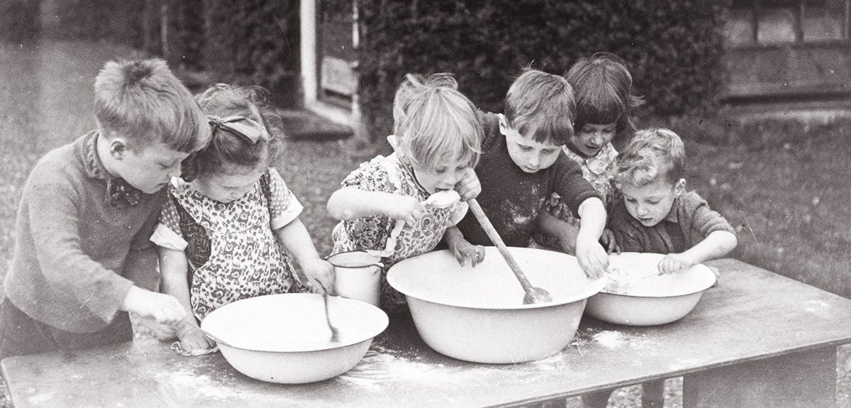 vintage photo of children baking