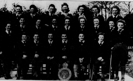 A group photo of land girls in WW2, including Peggy Harbour