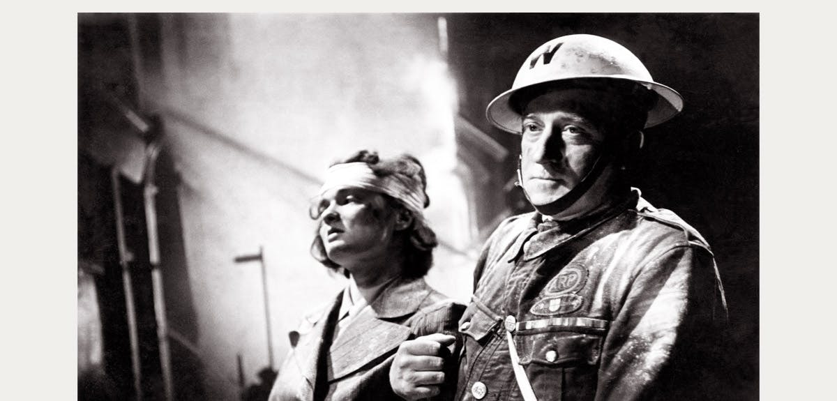 ARP warden helping the wounded in World War 2