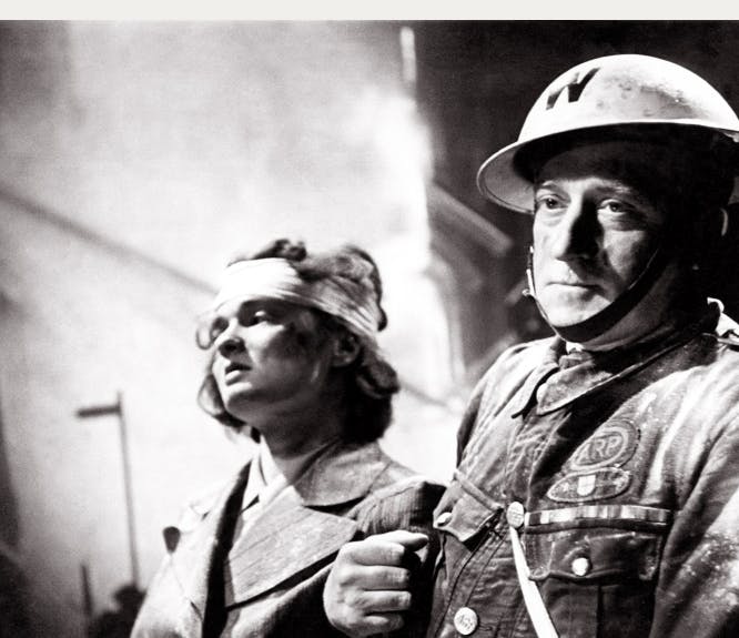 ARP warden helping the wounded in World War 2
