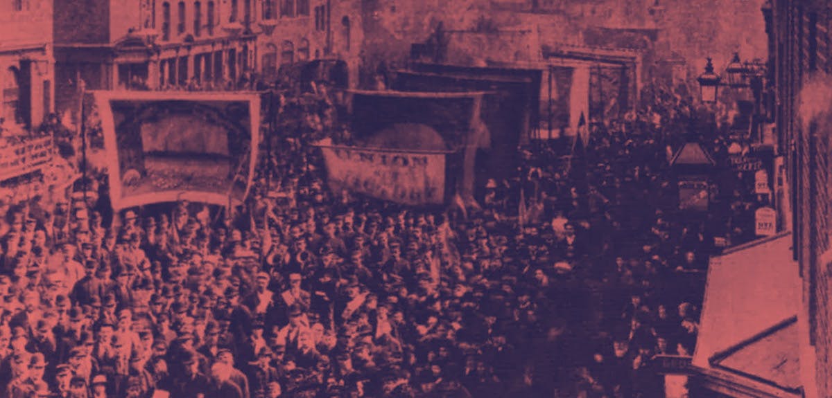 Photo of the London Docker's strike of 1889, with a coral-coloured overlay. 