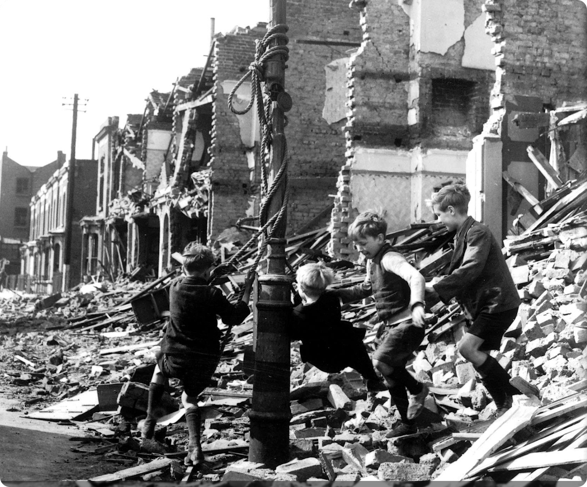 Children playing on a makeshift swing, 1940.