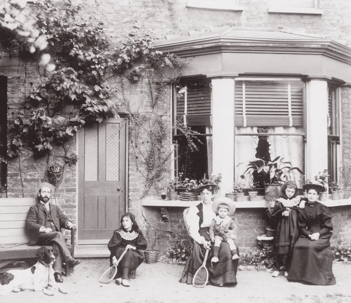 Family in Sussex garden with dog