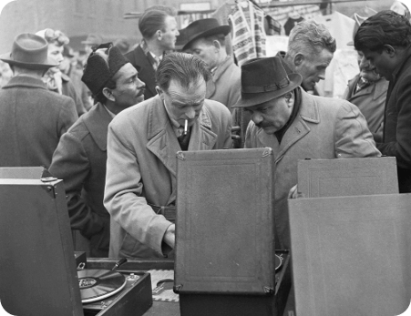 Men at a secondhand gramophone stall in the 1950s