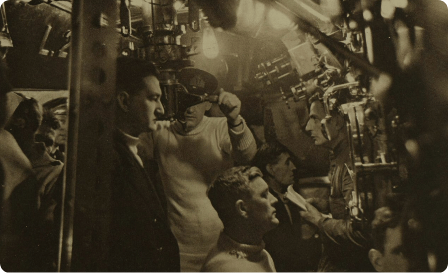 Officers and crew at work aboard a submarine
