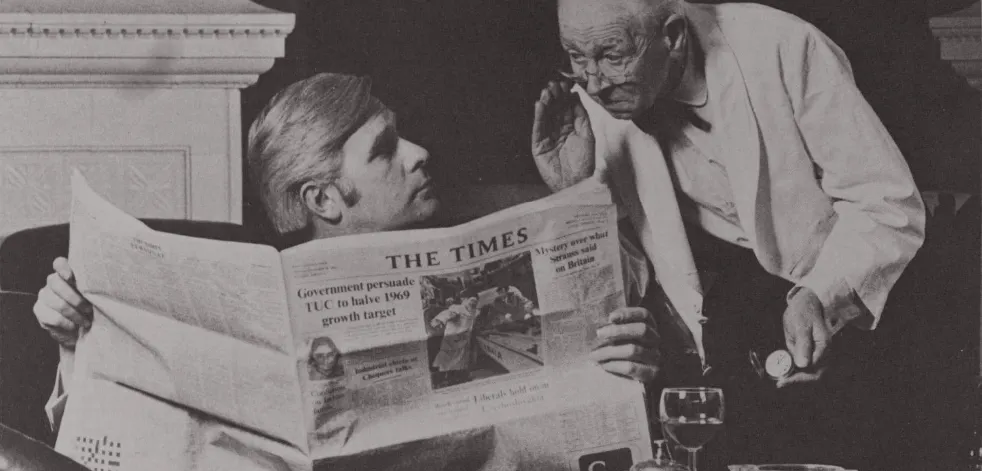 Two men and a newspaper