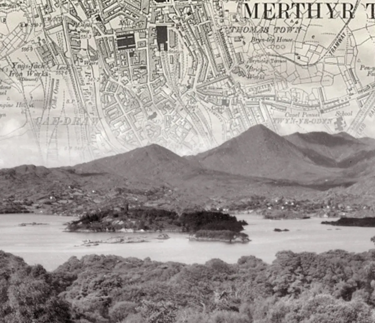 Black and white photo of a lake, with an old map of Merthyr Tyfil fading into the sky