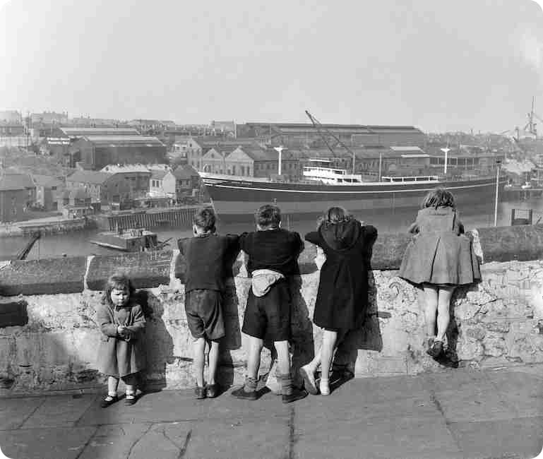 Children at the River Wear in County Durham, taken by Bela Zola in 1954, Findmypast photo collection.