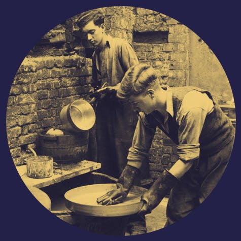 Vintage photograph of two young men working