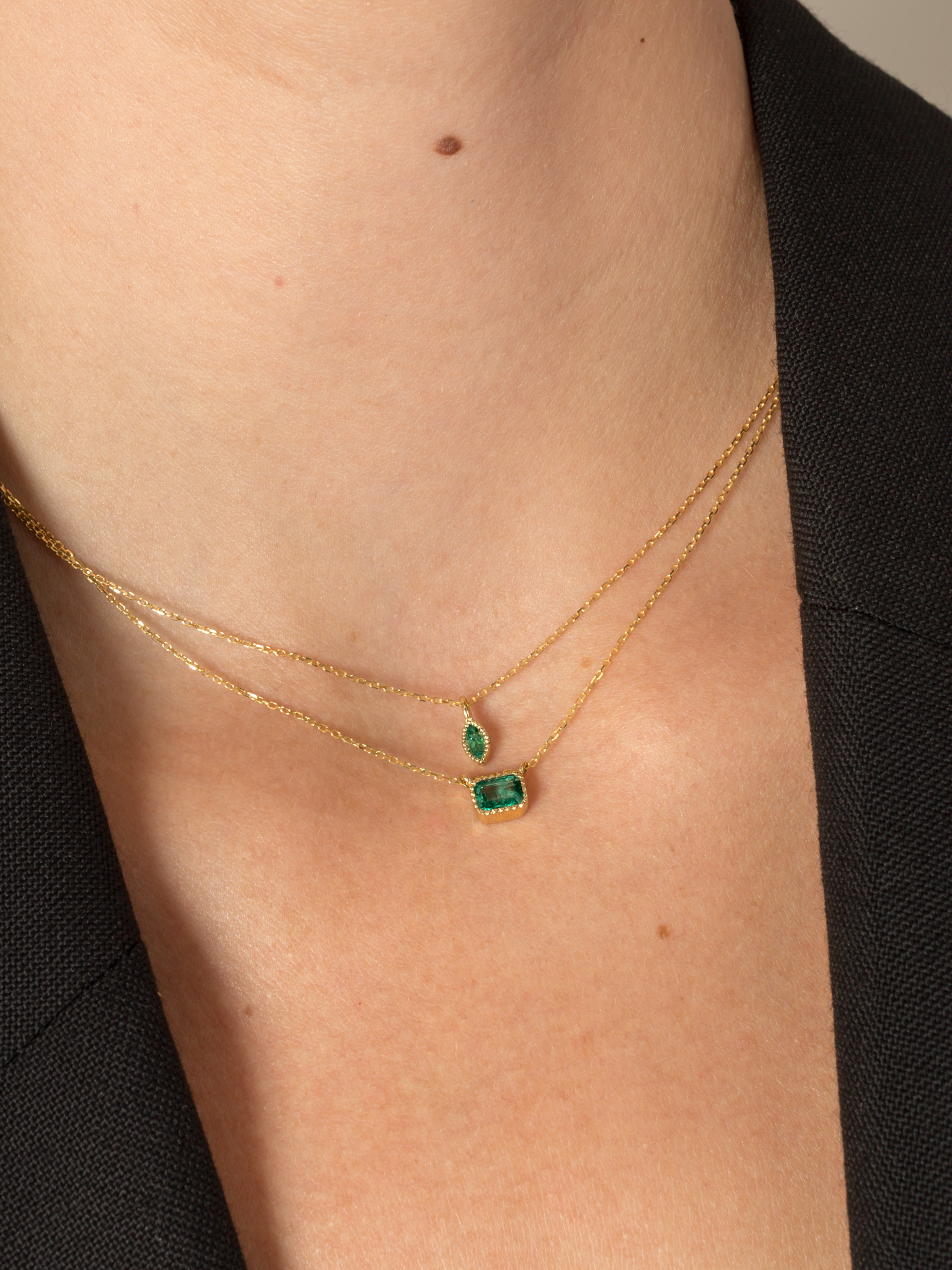 Deep emerald pendant necklaces