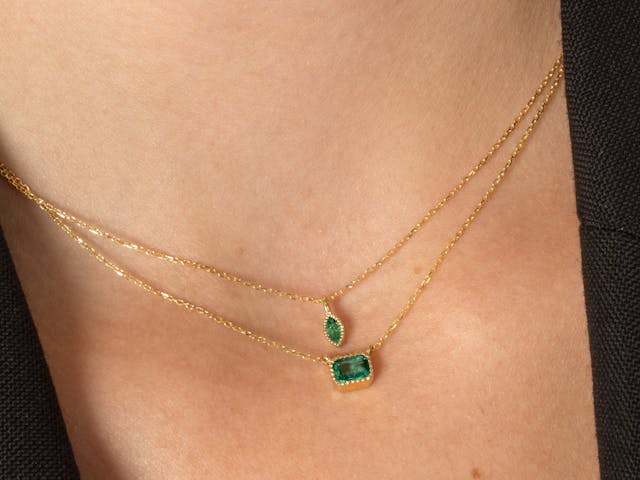 Deep emerald pendant necklaces