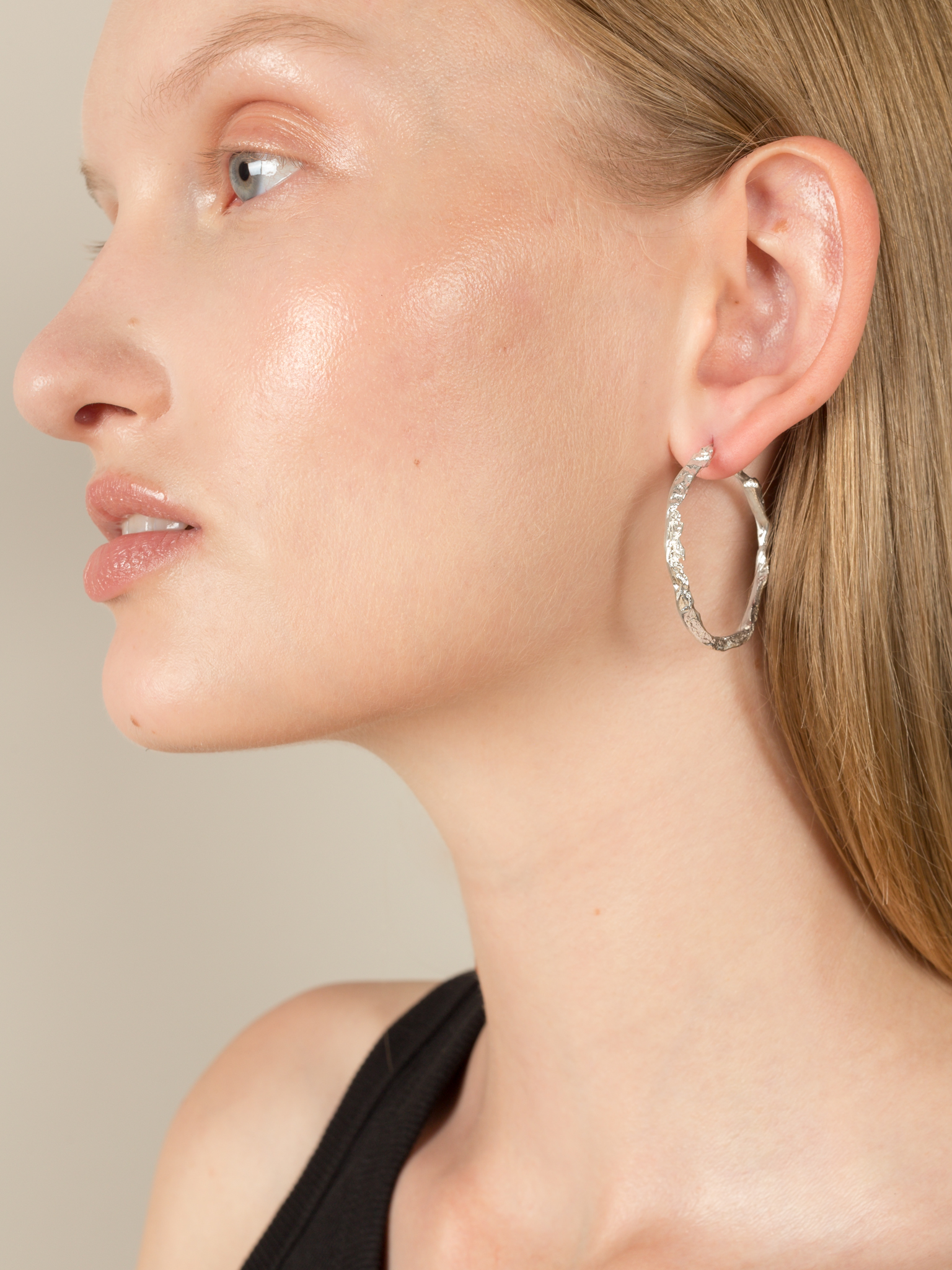 The contemporary classic silver hoop