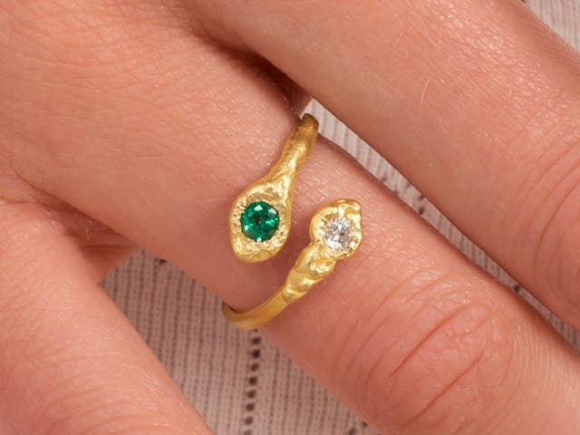 Deep emerald engagement rings