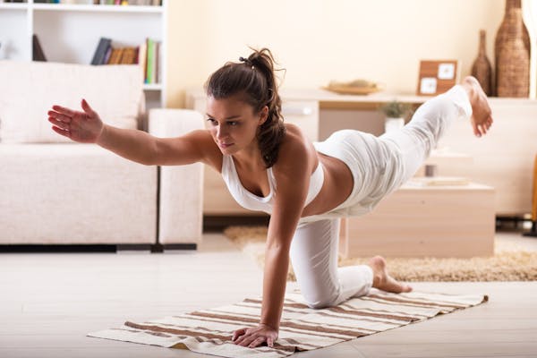 Image of a woman doing yoga
