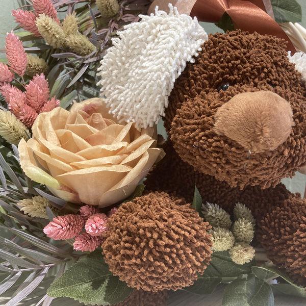 Coroncina con cane e girasoli