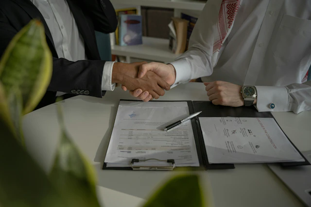 two people shaking hands