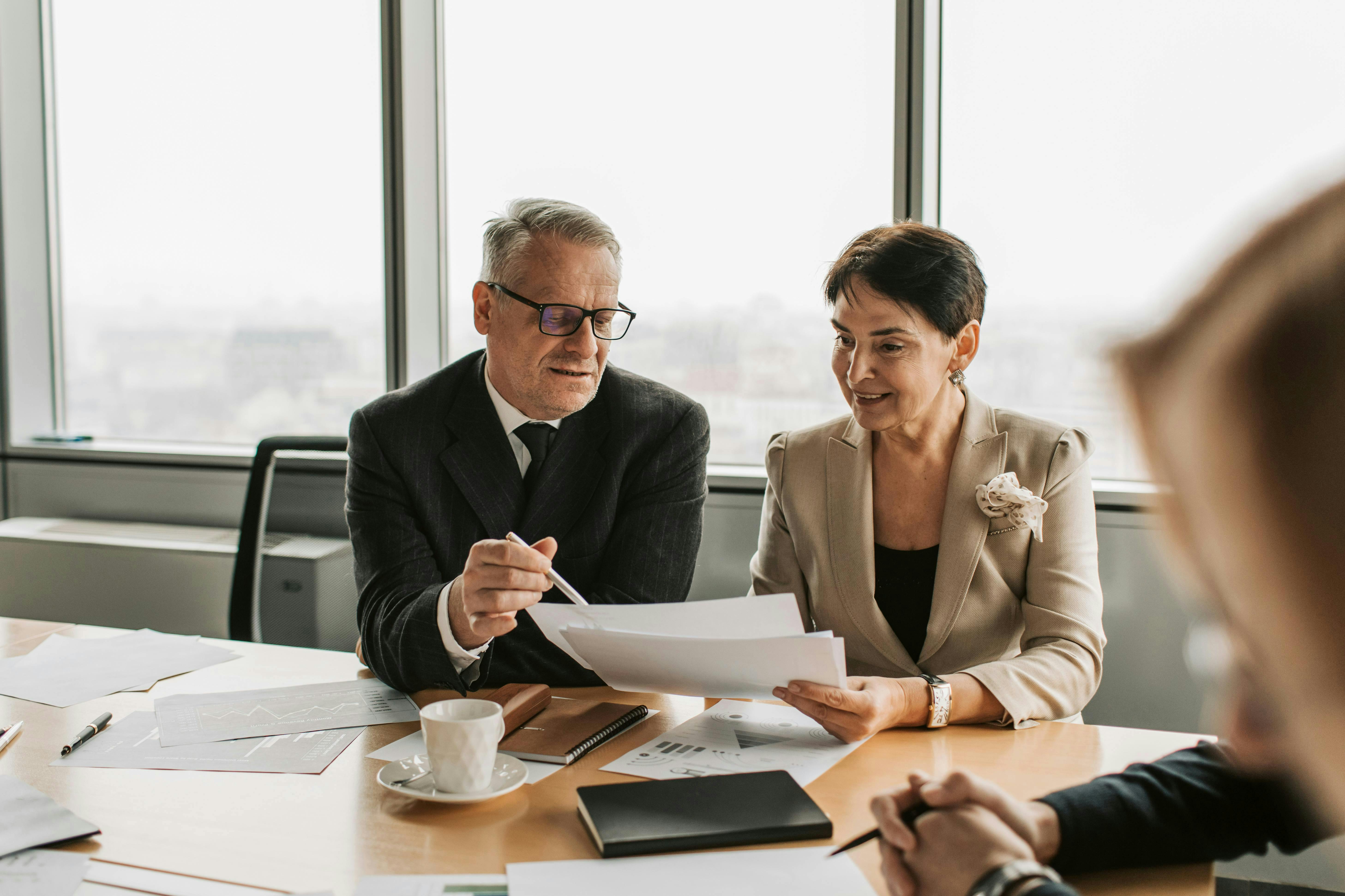 Business owner discussing details with an advisor