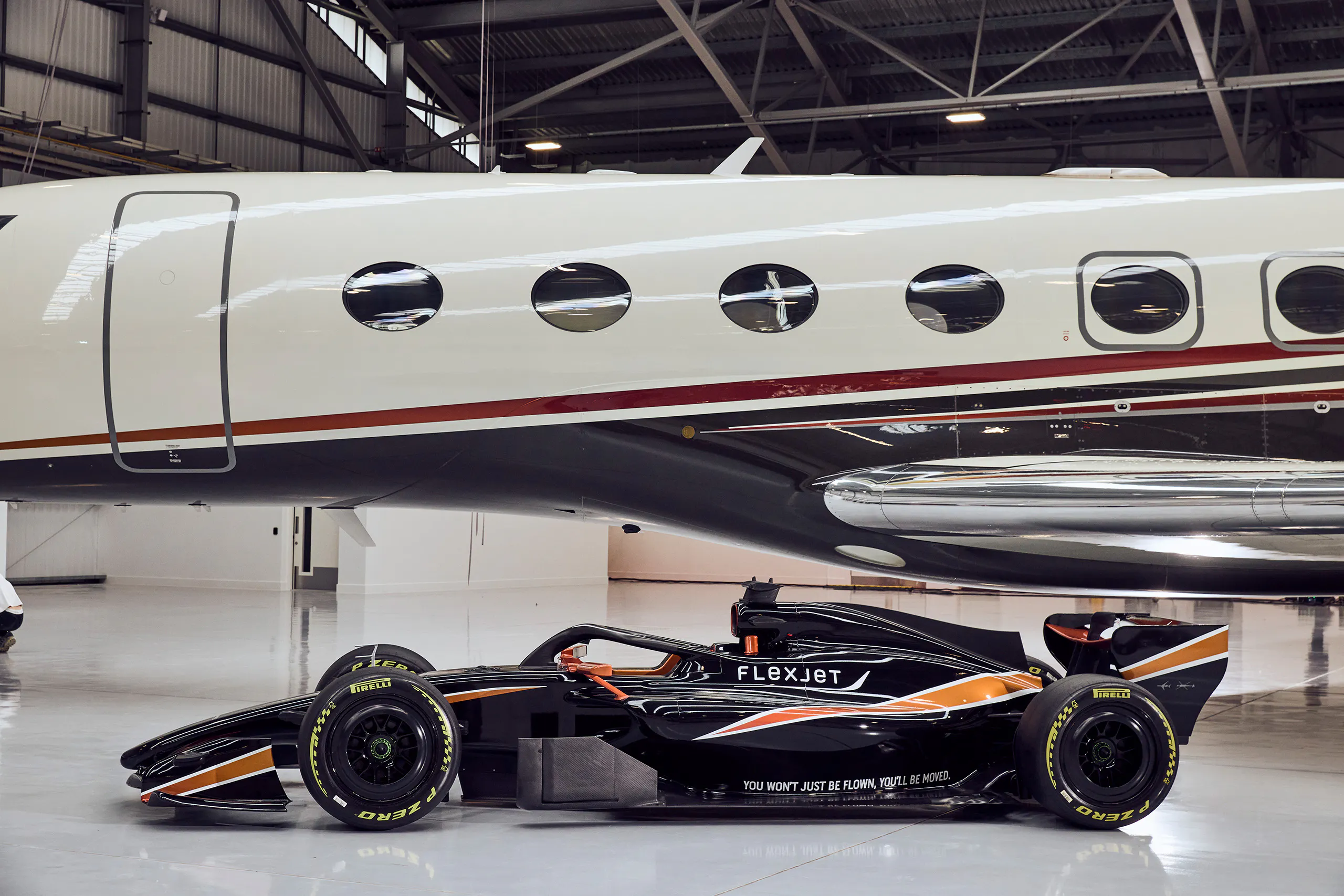 Flexjet F1® Car in front of a private jet