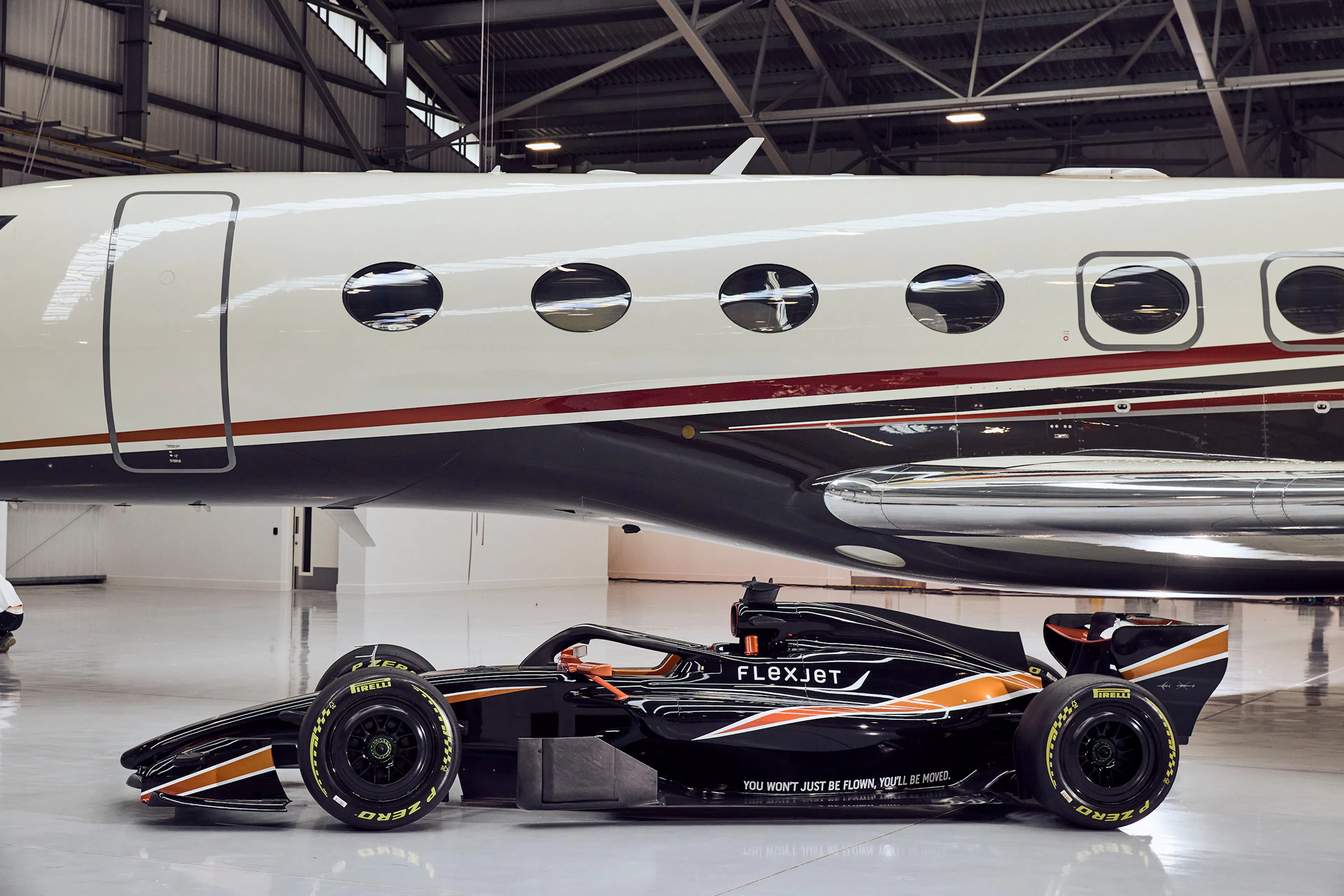 Flexjet F1® Car in front of a private jet