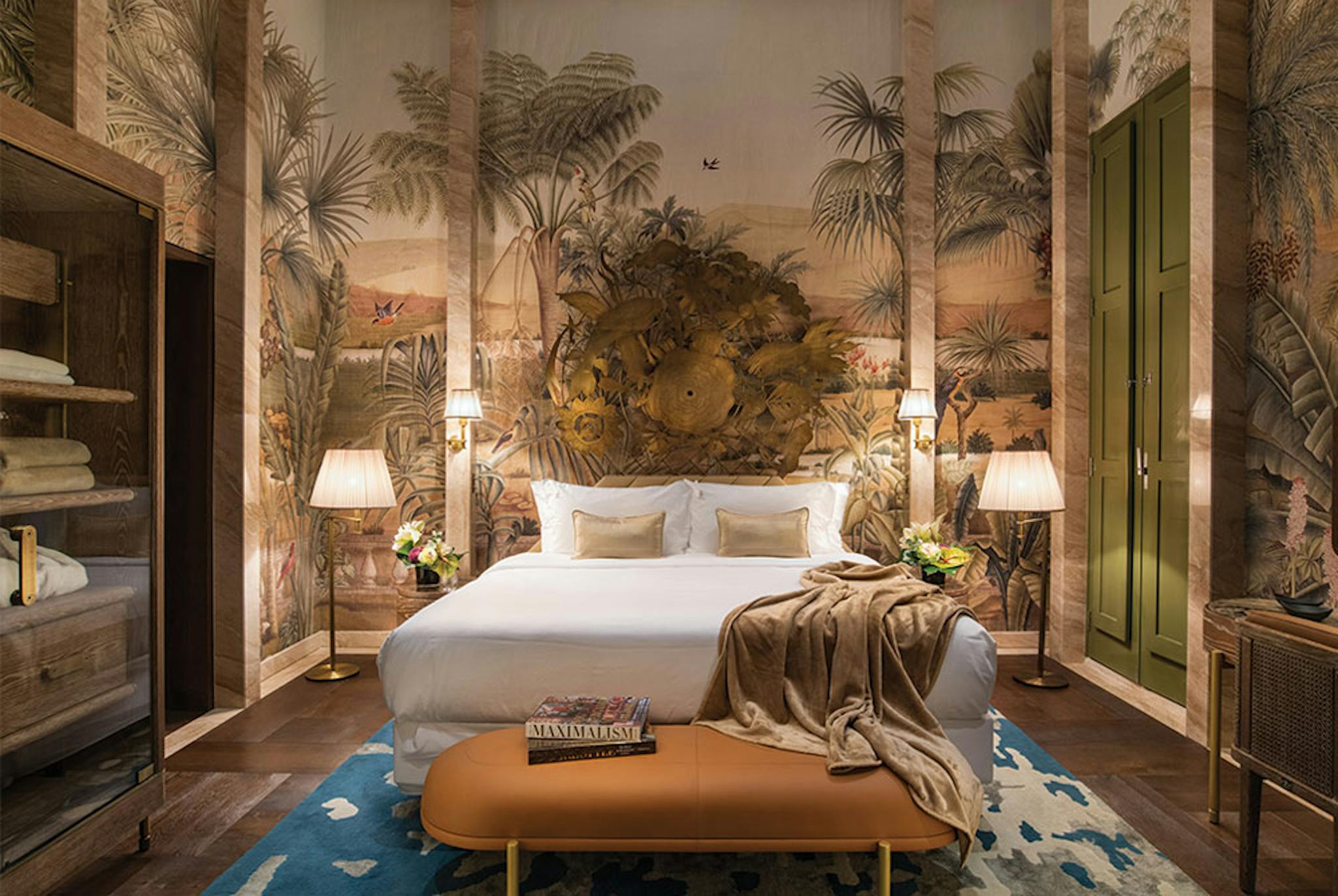 Bedroom with browns and greens and tans giving a woodsy but clean feel