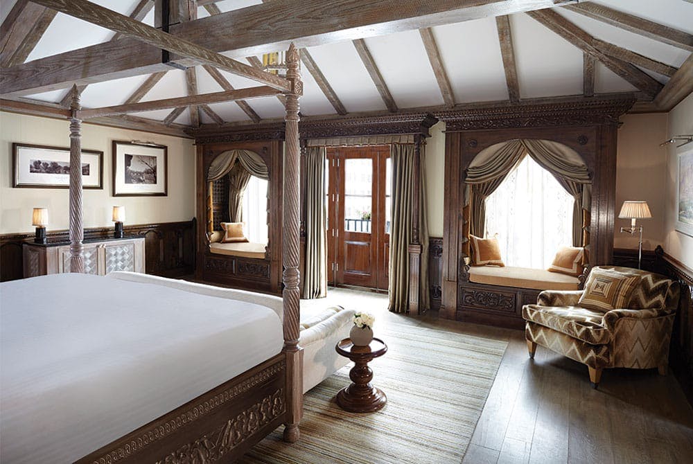 Wood and white linen bedroom