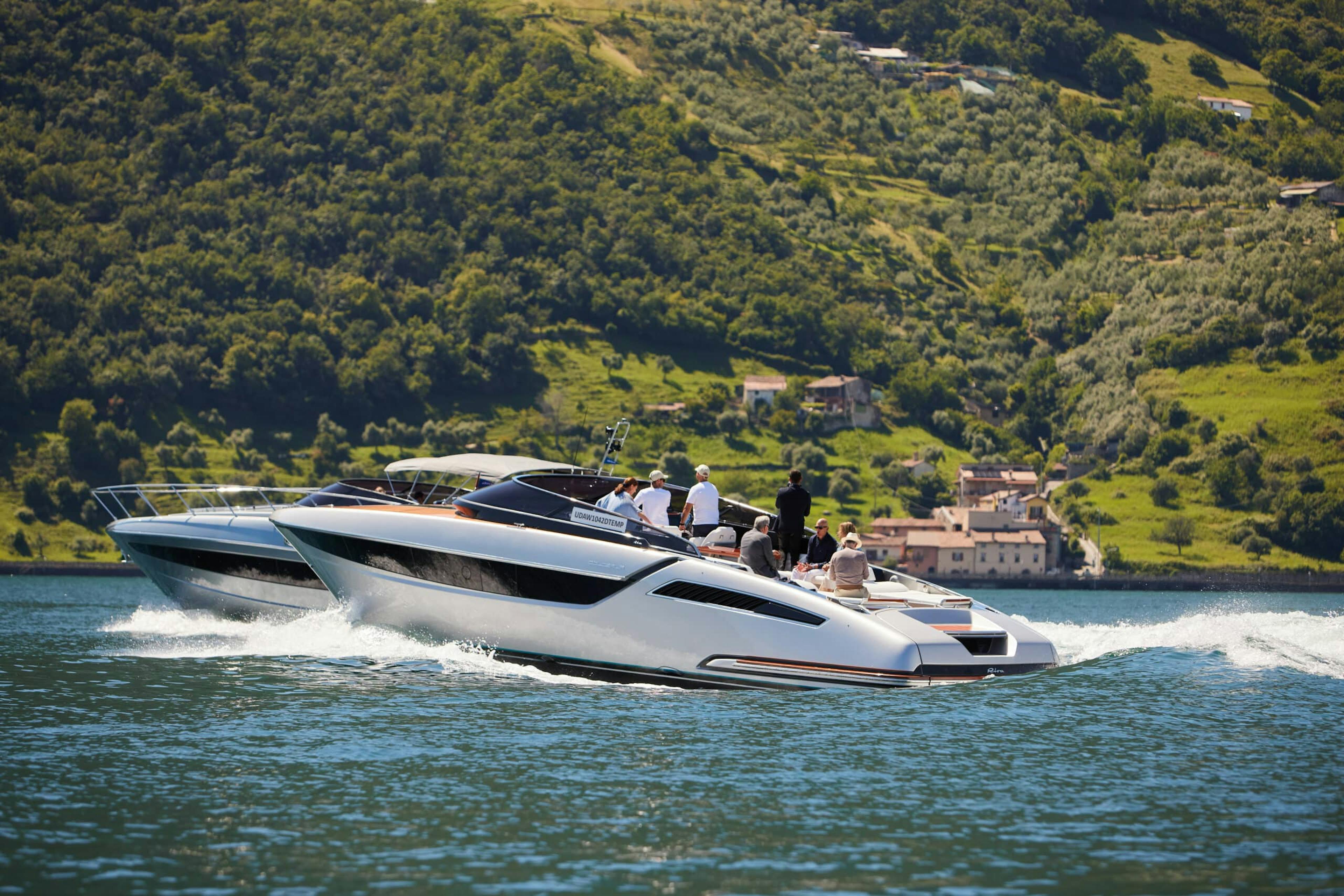 A modern boat on water with people