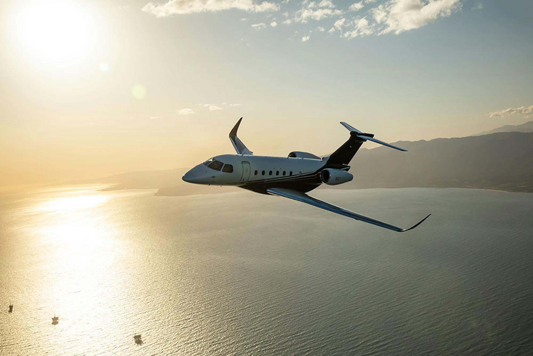 praetor 600 flying over ocean