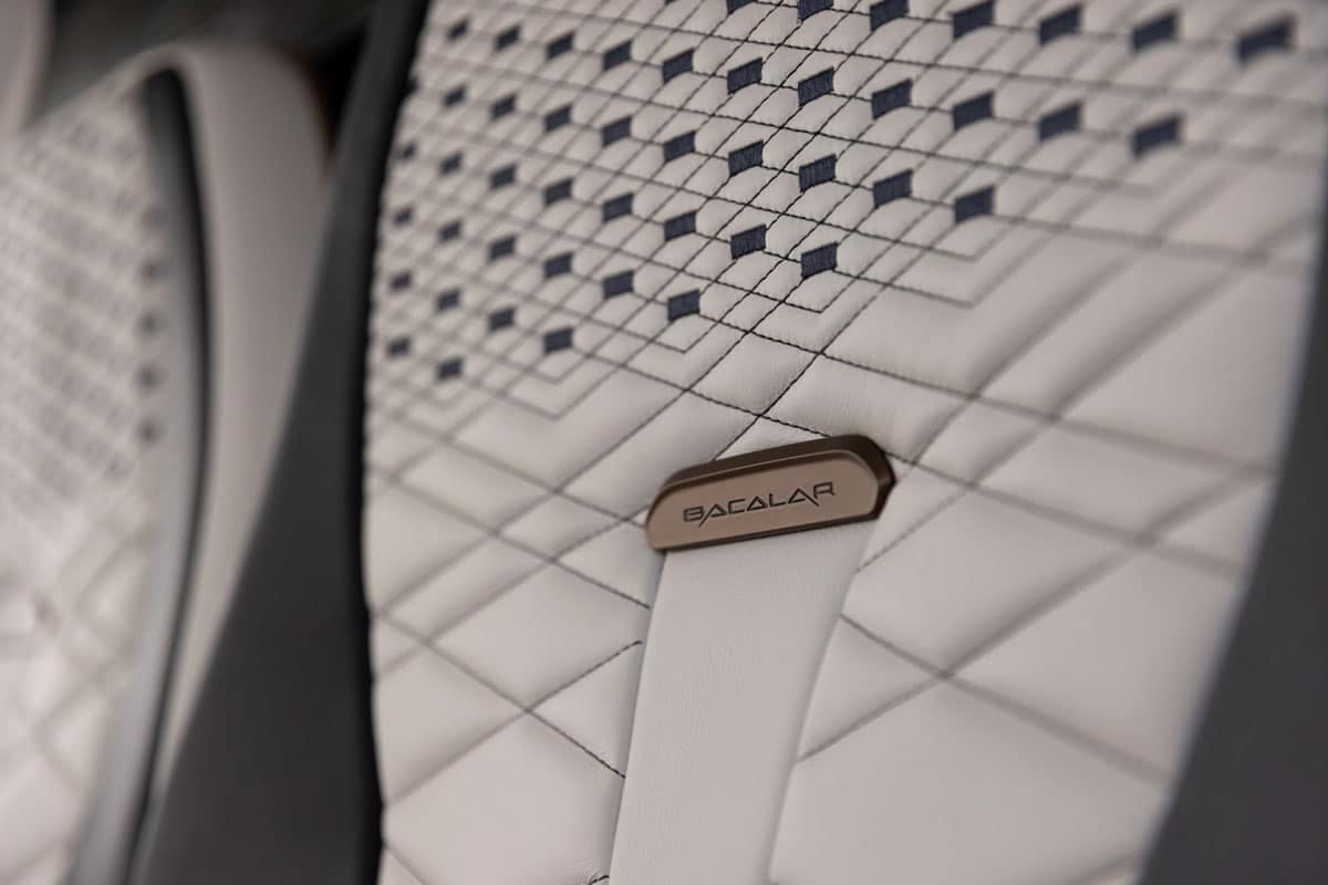 Inside the custom interior, the seatback upholstery in black and white pattern has a Bacalar tag