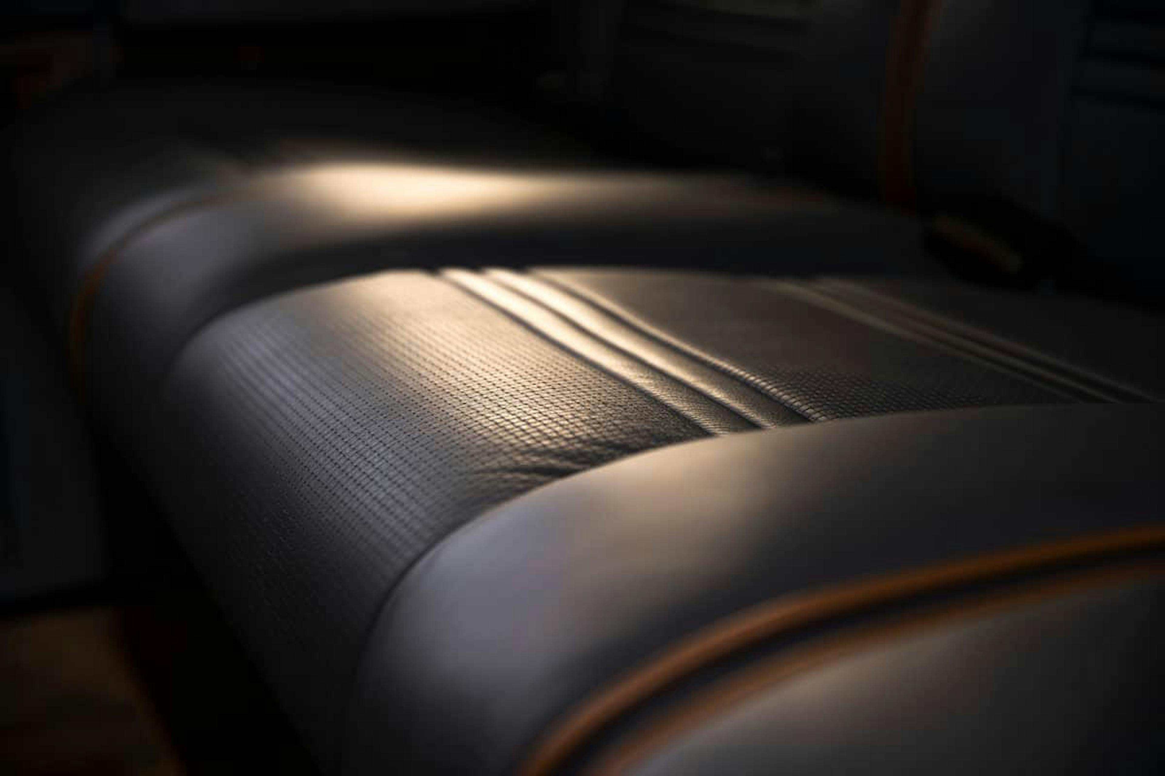 Closeup of the black patterned upholstery on the seat of the s76 Phantom