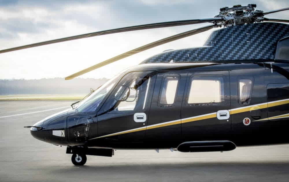 the front of a flexjet s76 on the tarmac