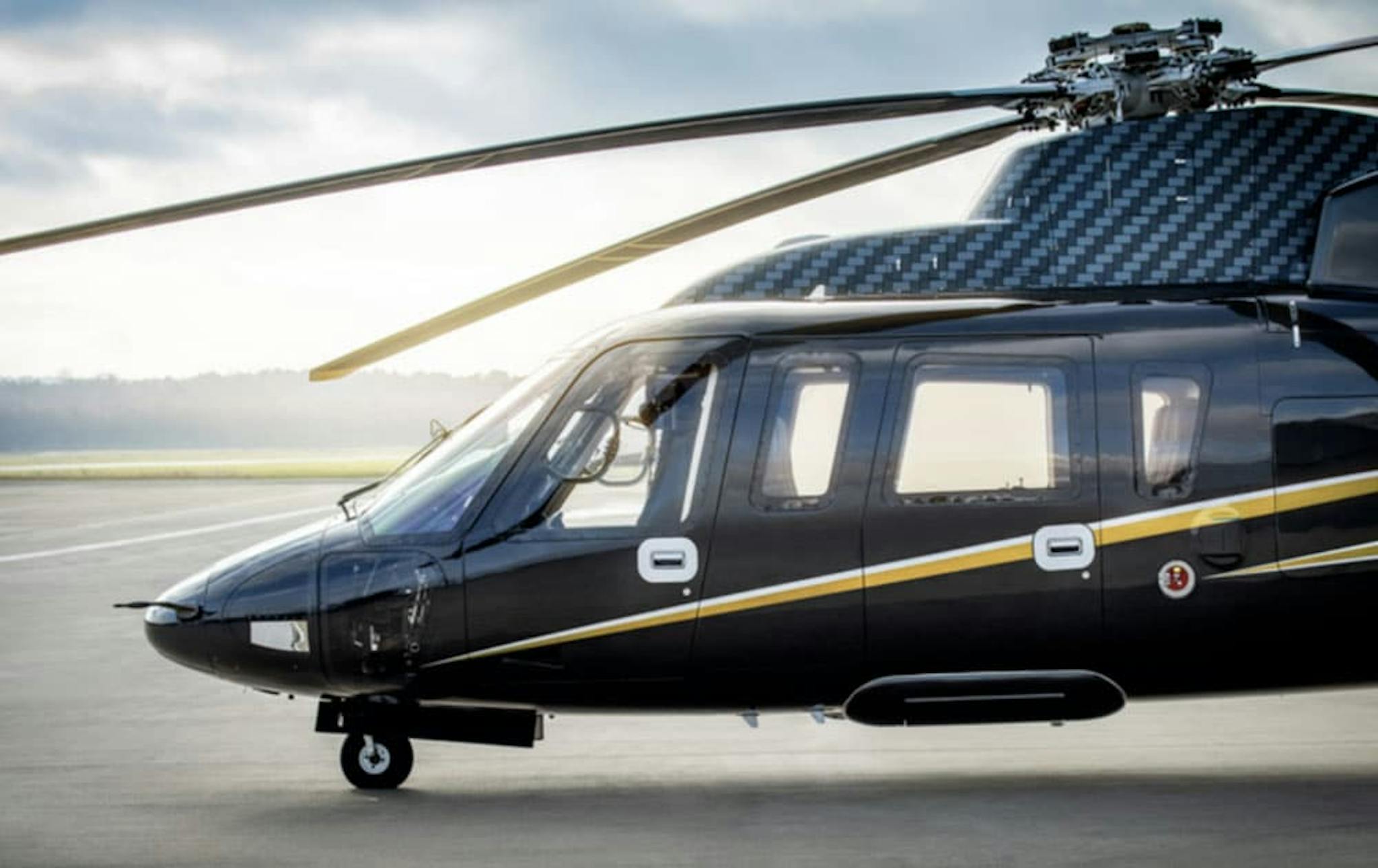 the front of a flexjet s76 on the tarmac