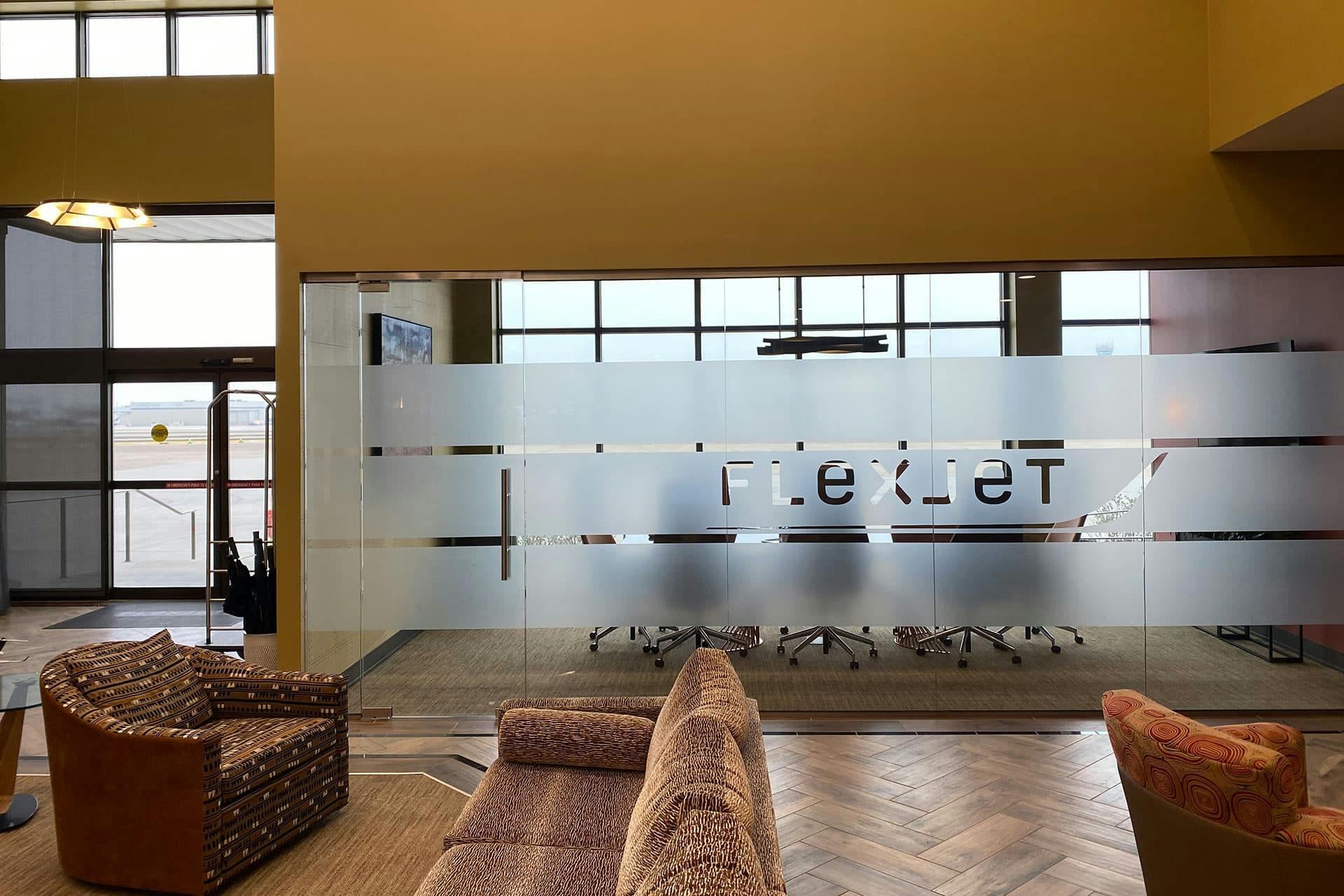 Inside the Dallas Private Terminal with flexjet branded frosted glass