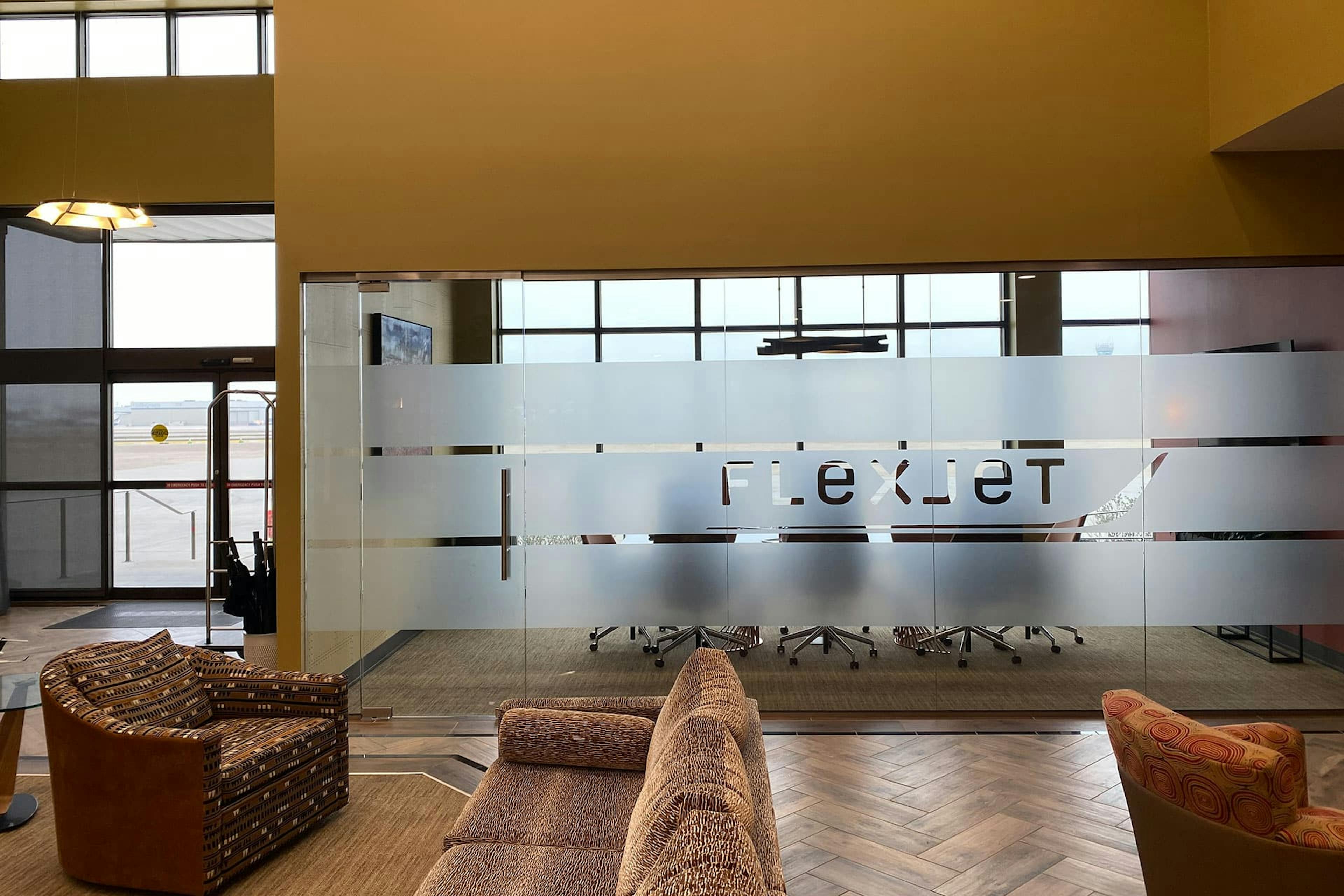 Inside the Dallas Private Terminal with flexjet branded frosted glass