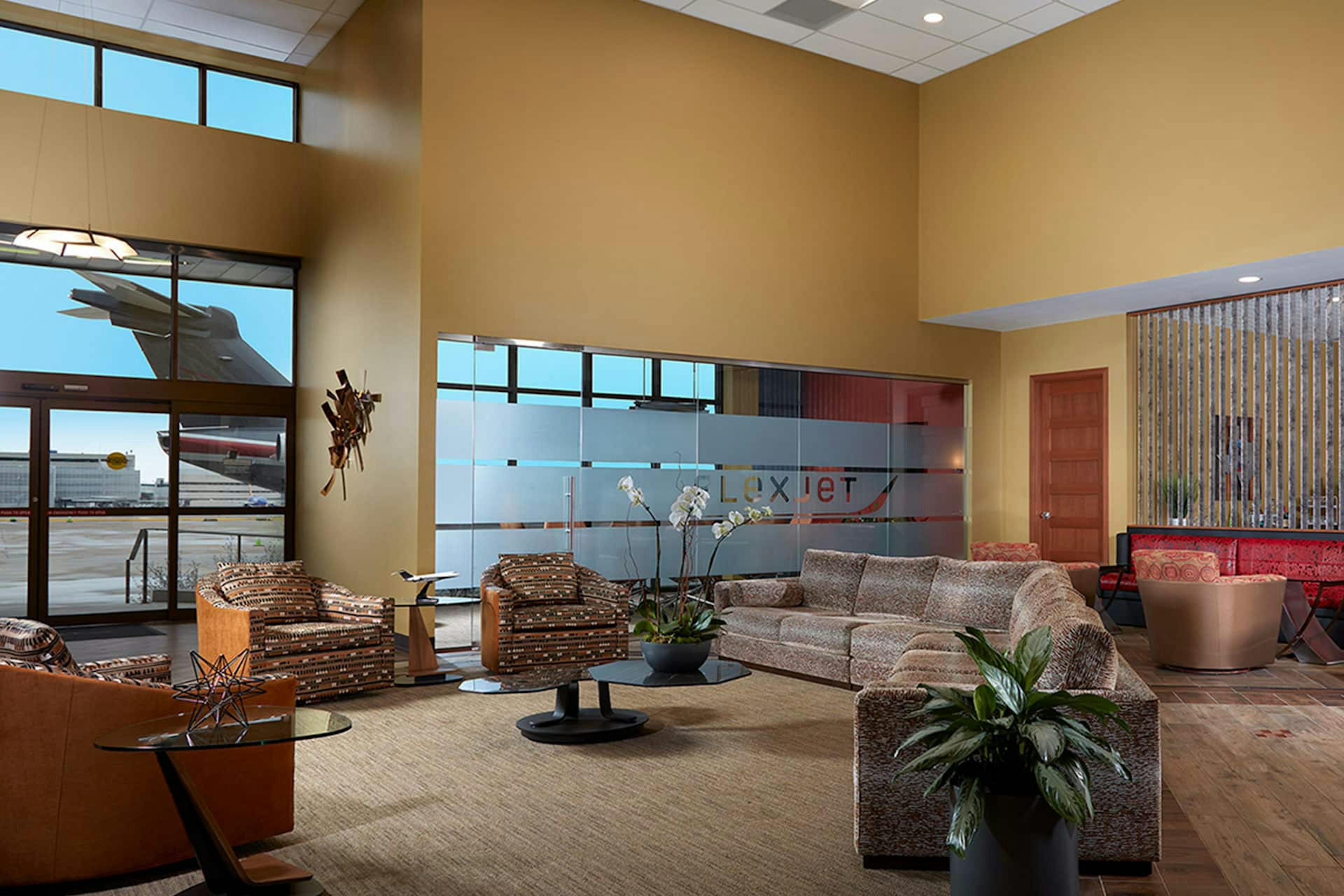 Inside the Dallas Private Terminal with tan tones and lots of seating