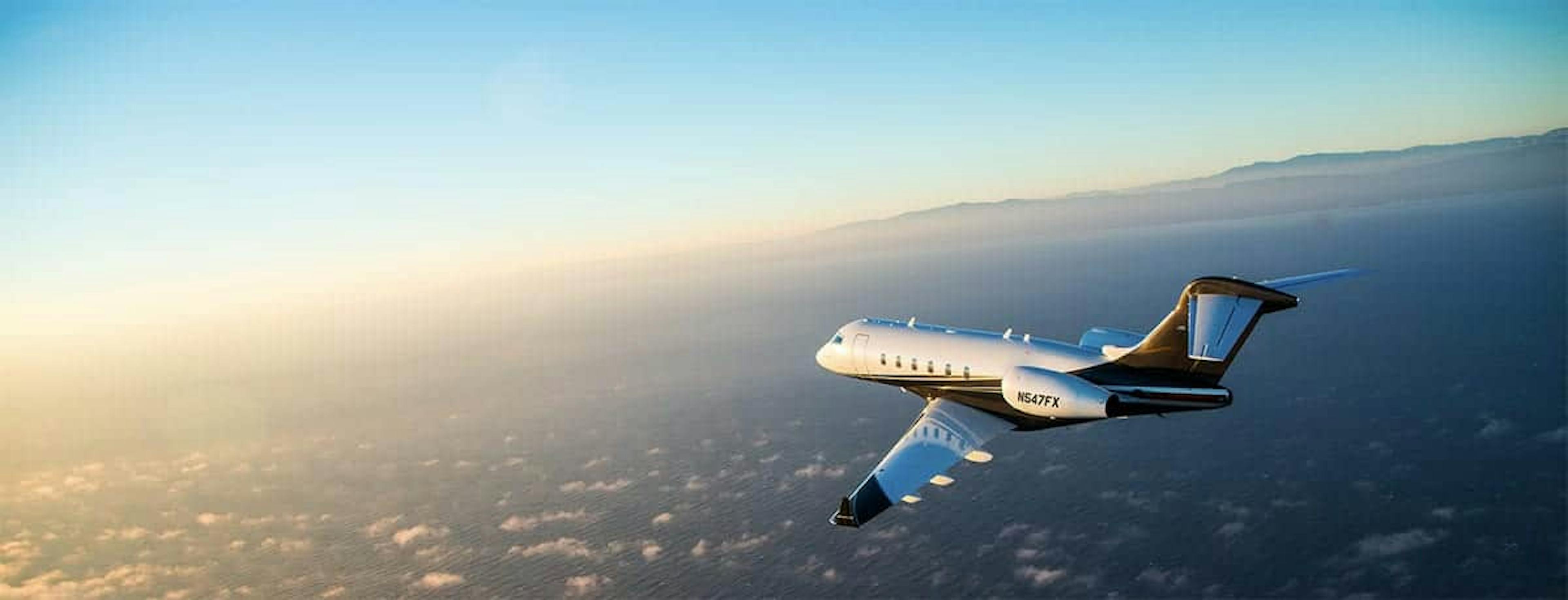 Airplane flying off into the susnset