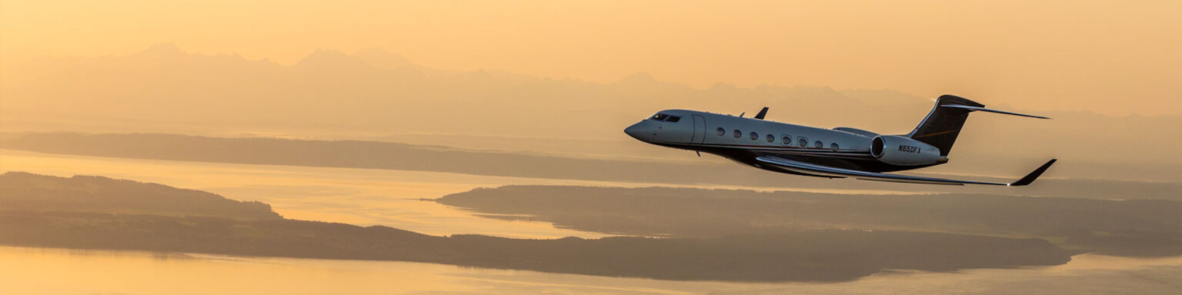 Access program image spacer of a flexjet aircraft flying on a yellow tinted skies