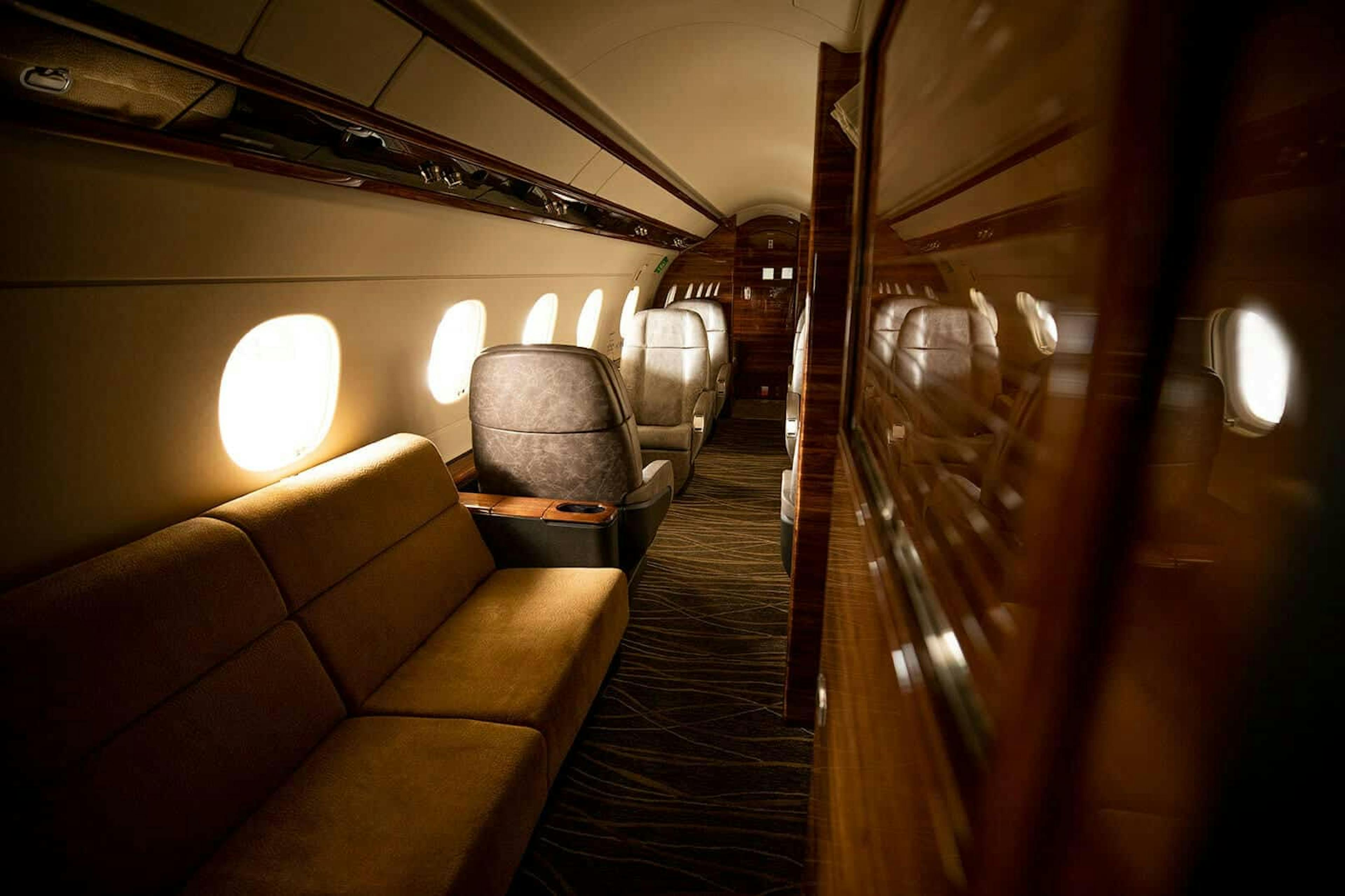 Chestnut, Flexjet, private jet, Legacy 450, jet interior, midsize, super midsize, mid cabin, seating view, mid cabin view, LXi Cabin Collection