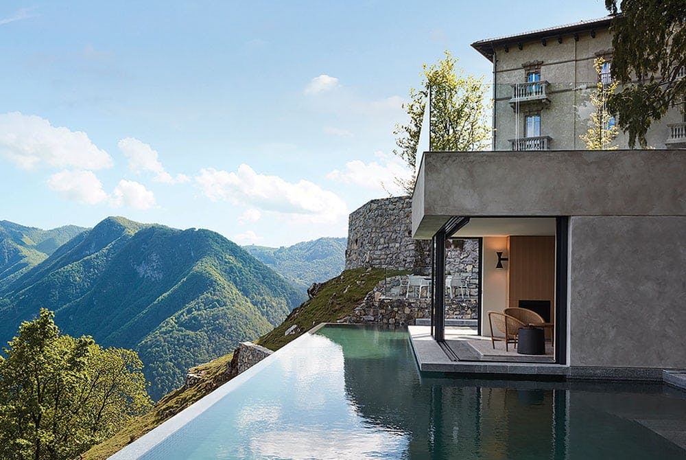 infinity pool at the Stay One hotel looking over the mountains