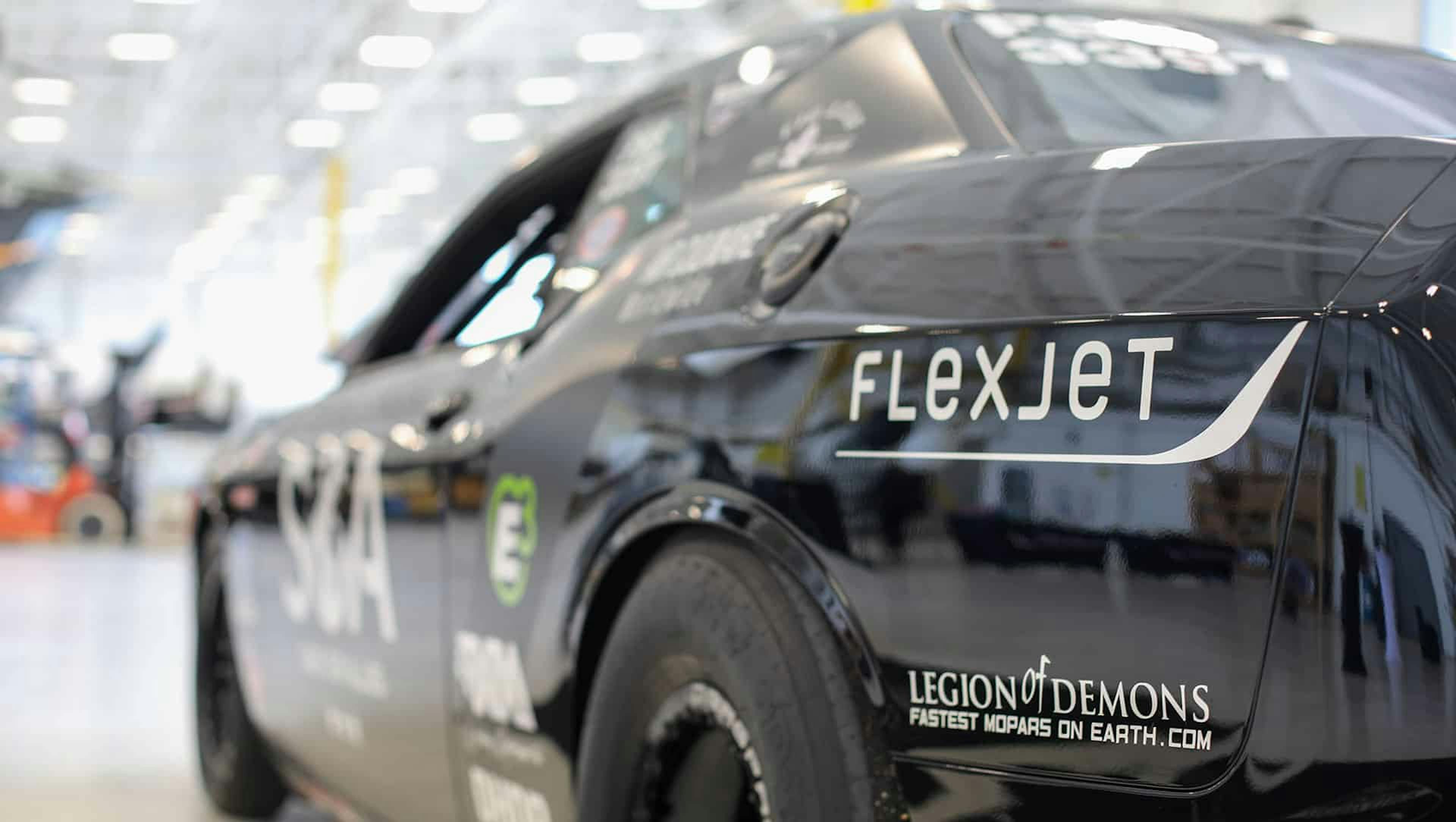 a race car representing flexjet and nhra partnership