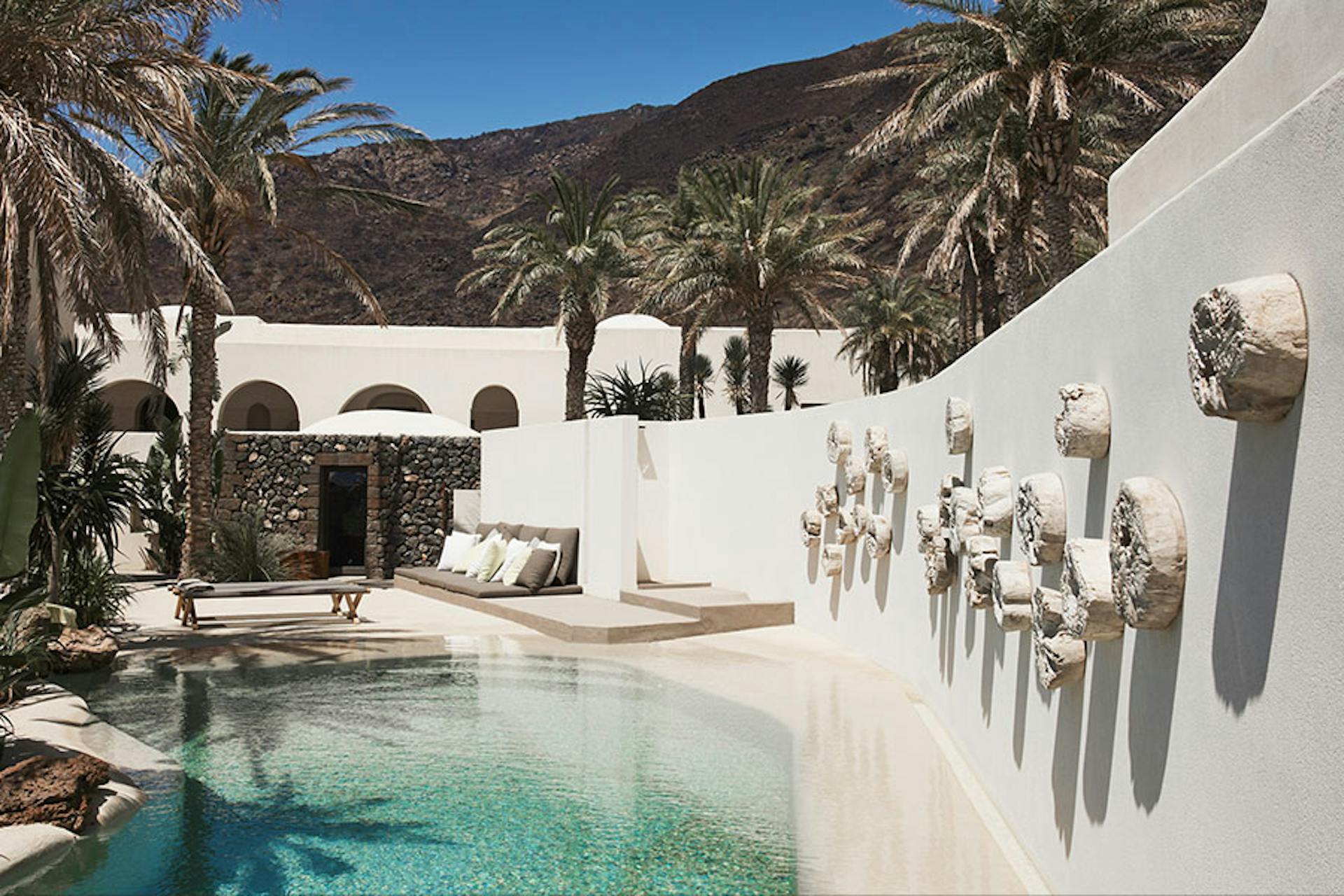 grotto style pool in a desert hotel setting