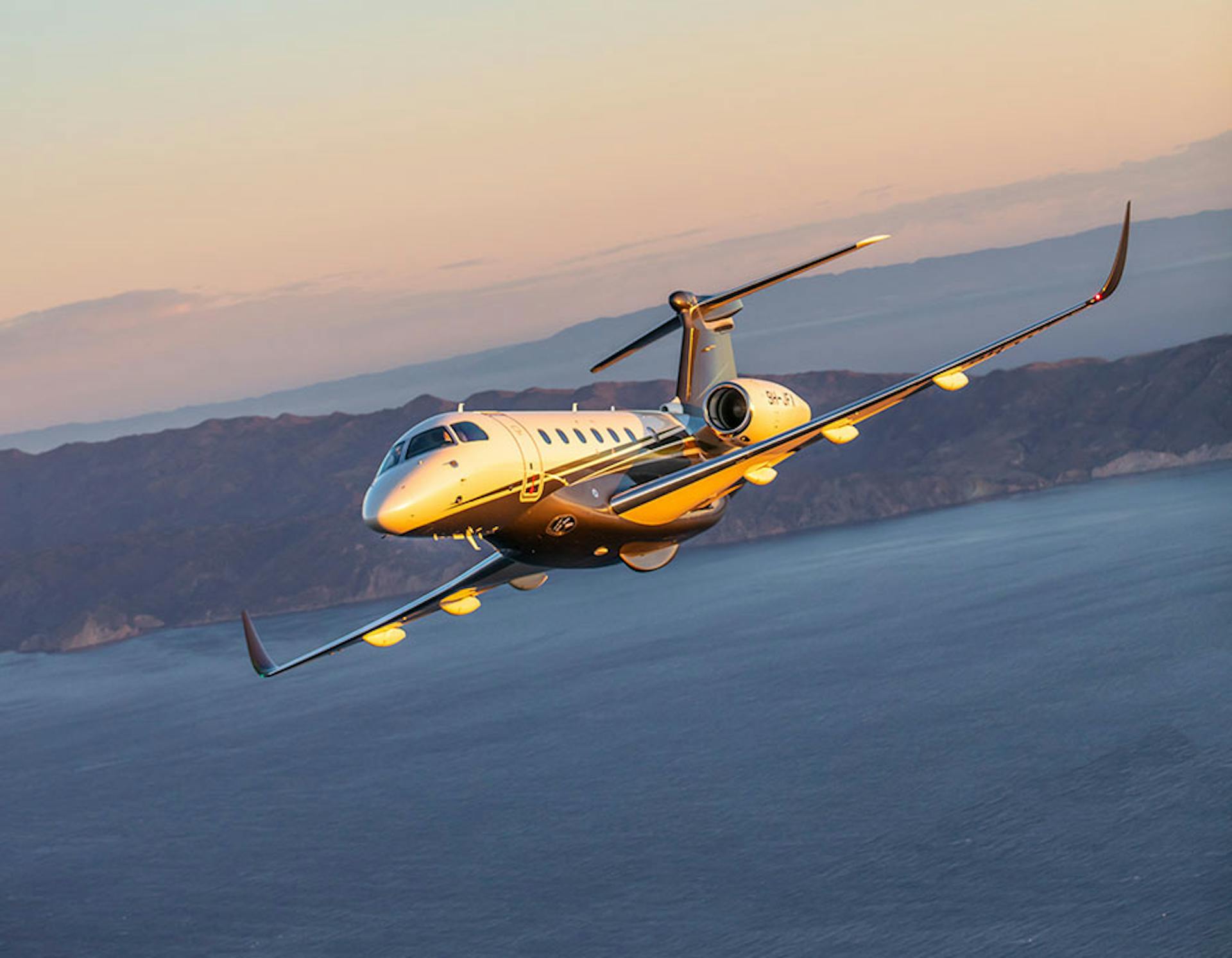 Praetor 600 flies over water