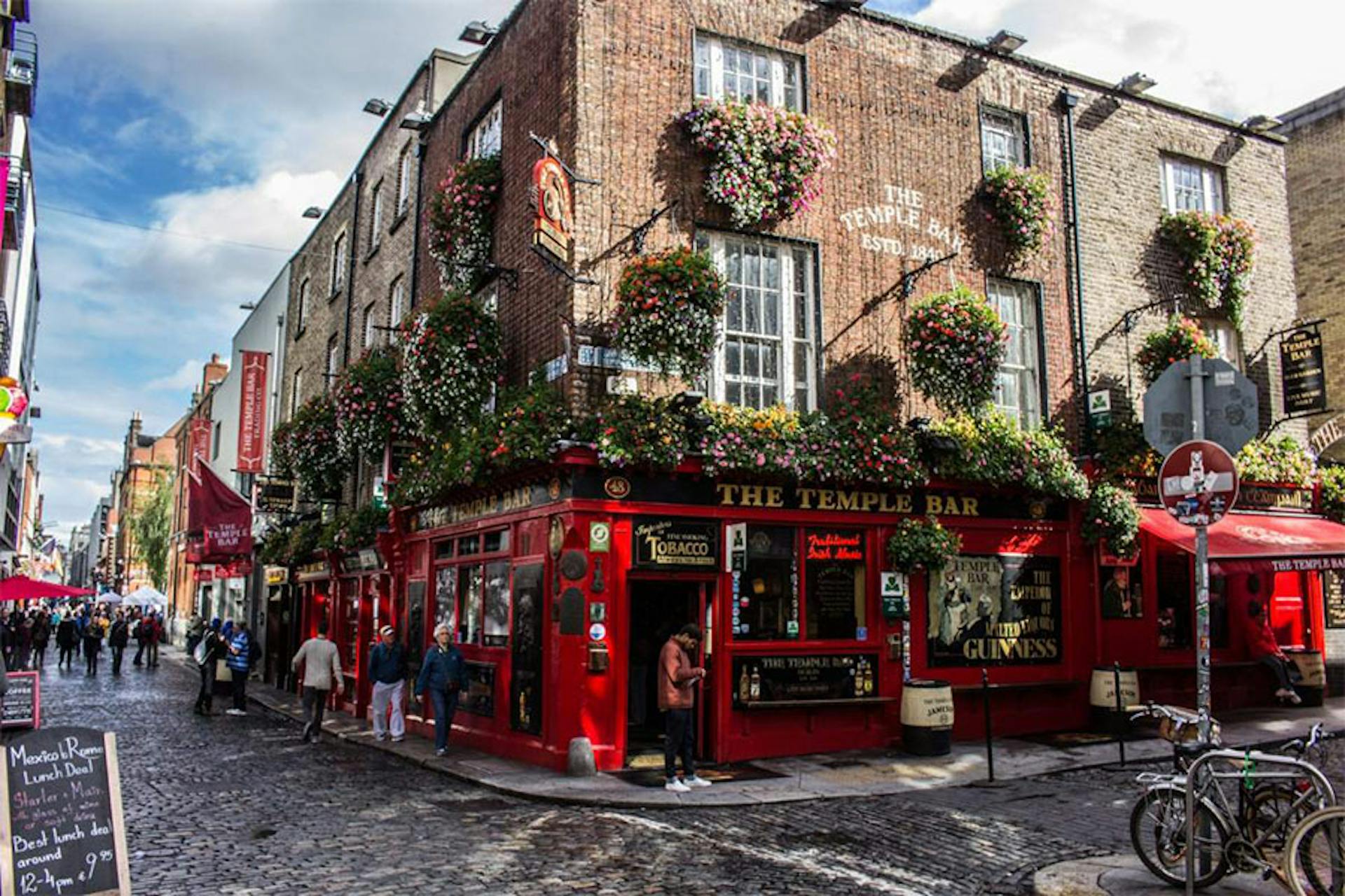 Dublin pub front at the corner of a cobblestone street