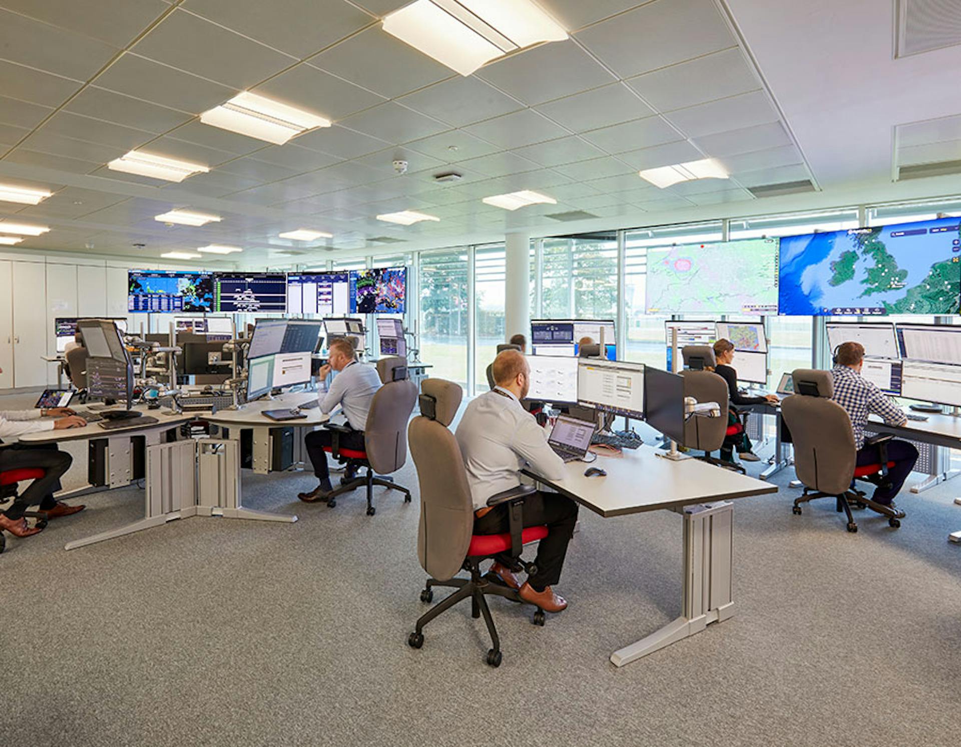 Inside the Flexjet Tactical Control Centre office with workers