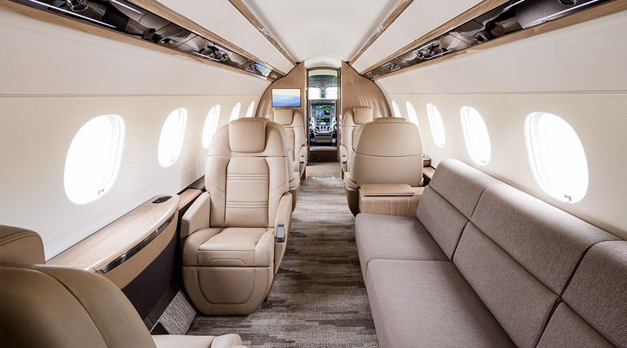 view down the center of the interior of a flexjet aircraft