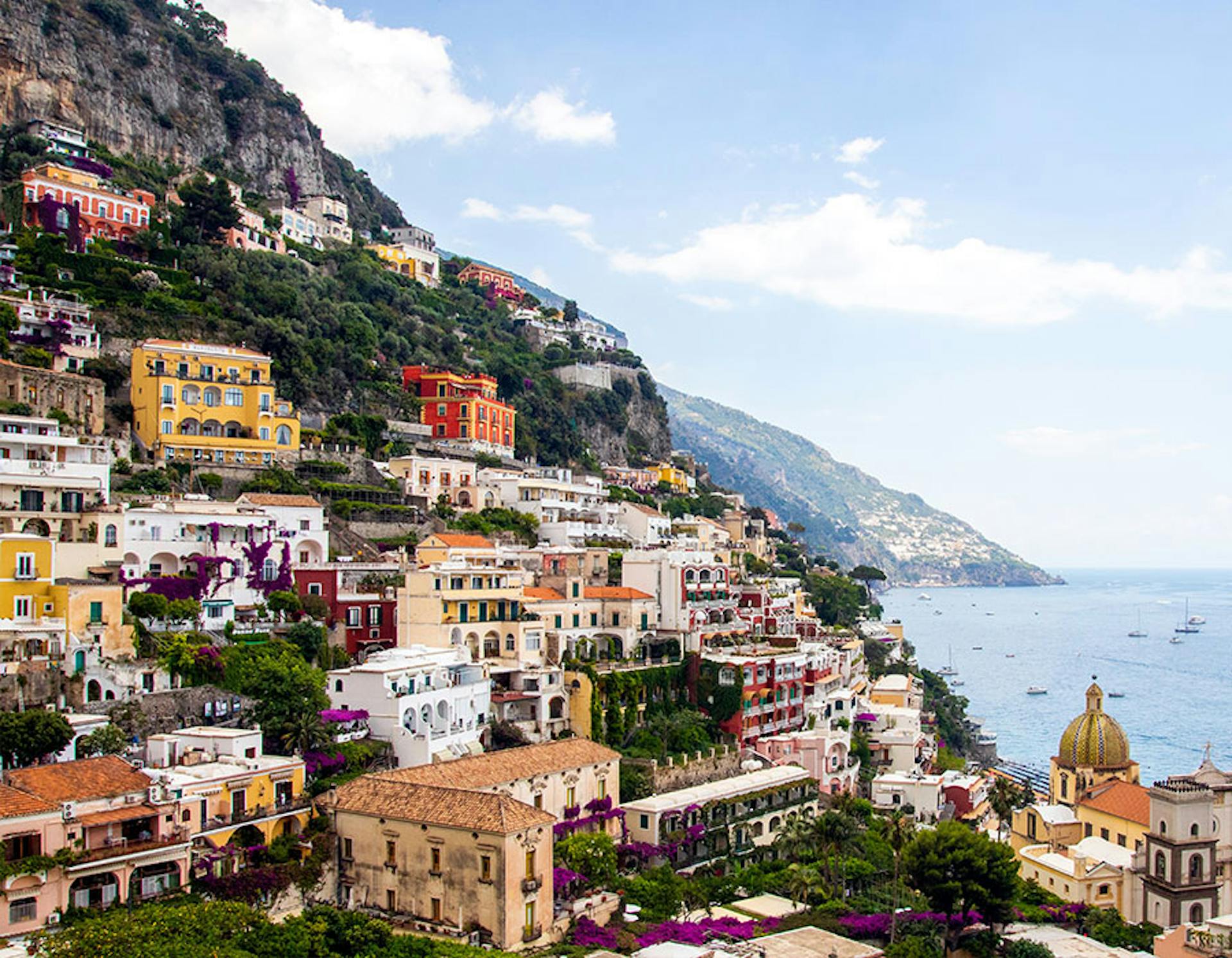 amalfi coast town along the side of the mountain at the bay