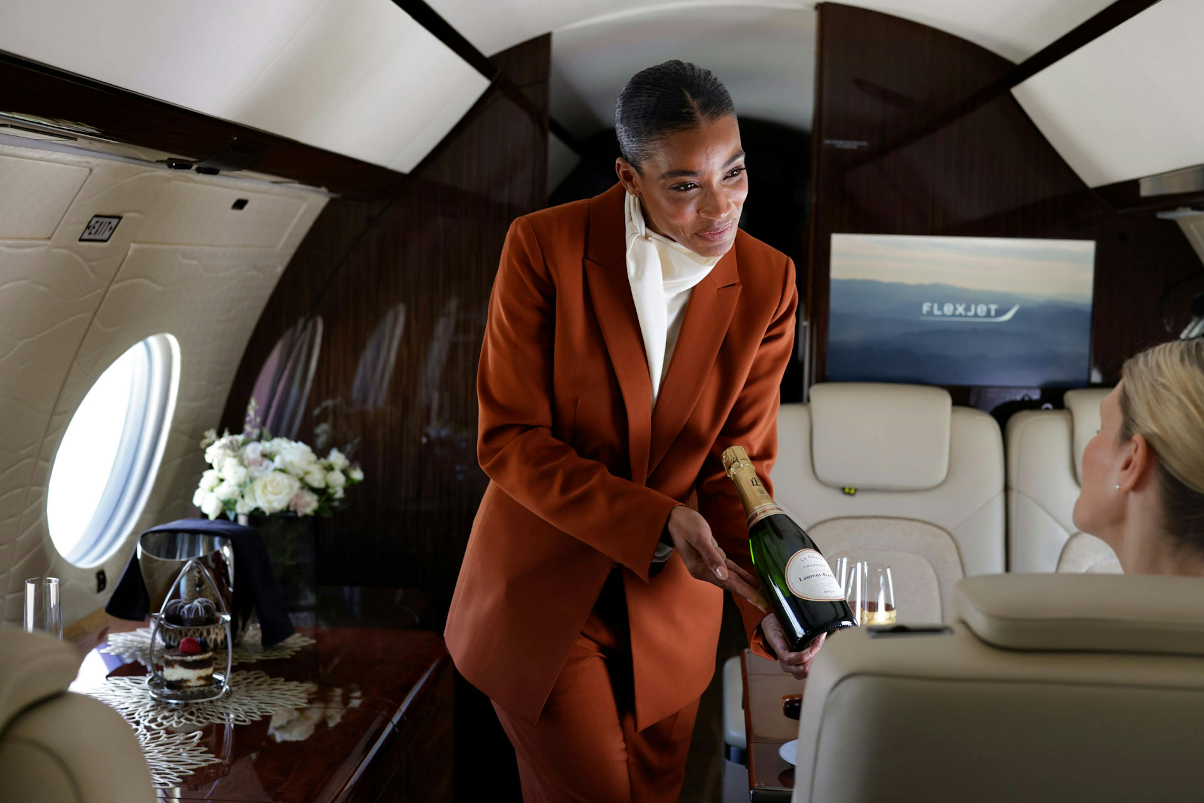 cabin server serving champage