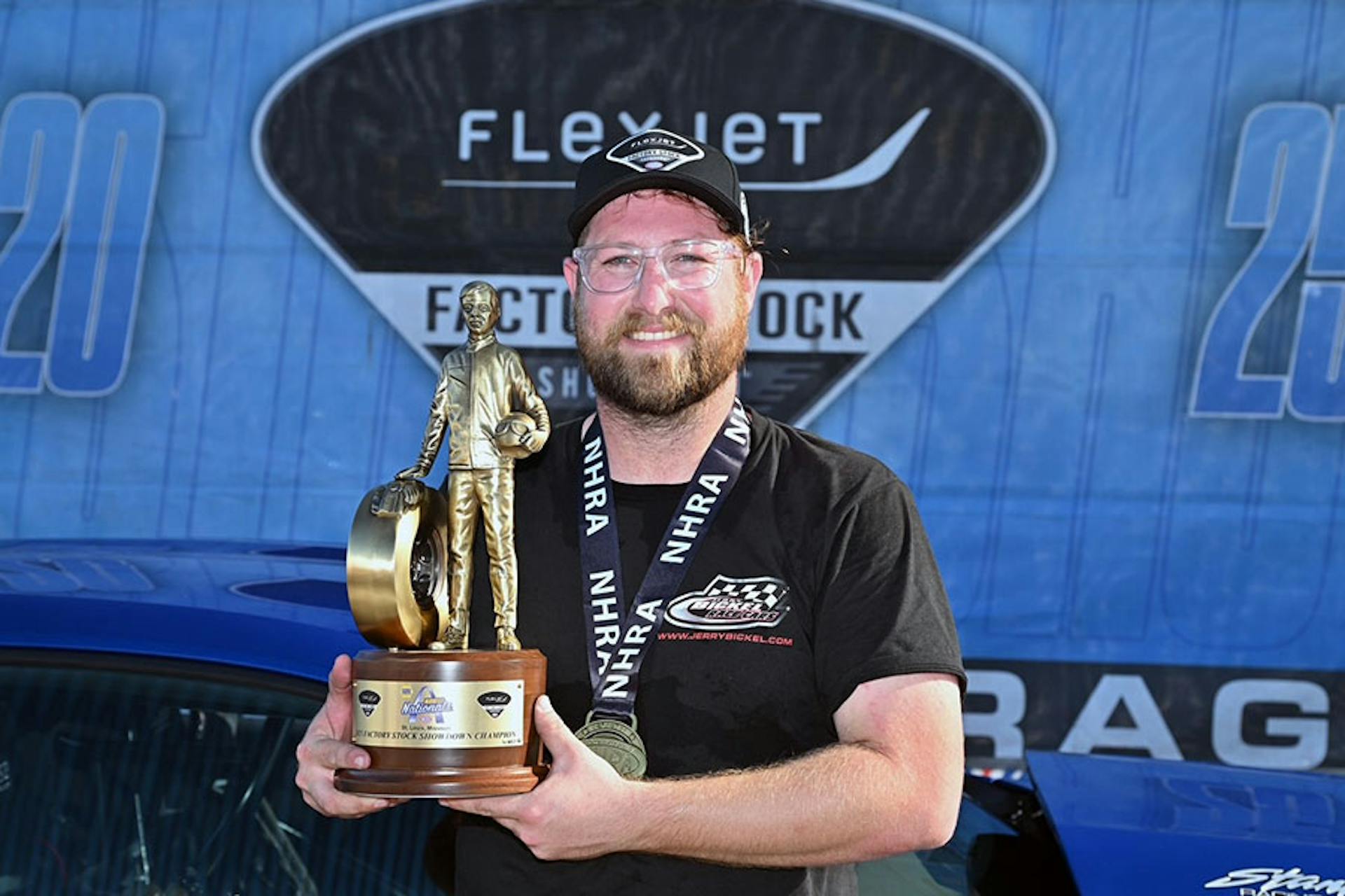 Ricky Hord celebrates win with iconic Wally trophy following his win in St. Louis at the NAPA Auto Parts NHRA Midwest Nationals