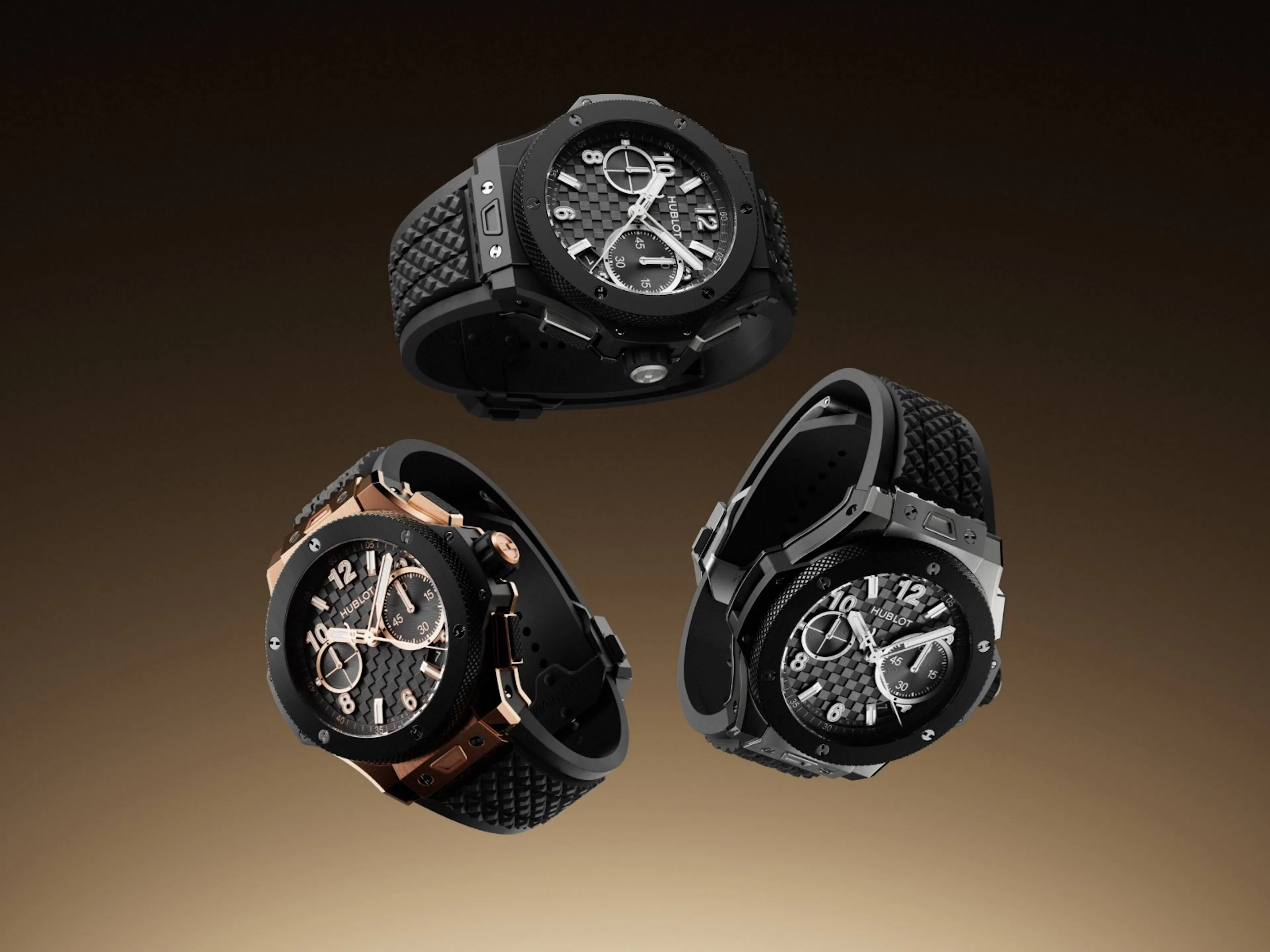 three watches in the center of a black to tan gradient background