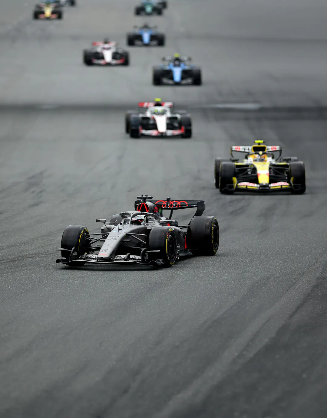 Some F1 cars on a track
